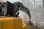 Baggerprozessor Volvo EC140B mit Woody 50