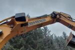 Kettenbagger LIEBHERR R920 mit WOODY WH6-1 mit Rückewinde