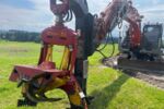 HITACHI ZX135US mit WOODY WH50-1