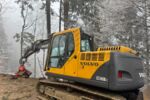 Baggerprozessor Volvo EC140B mit Woody 50